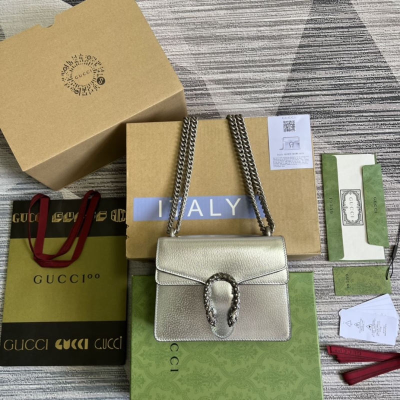 G*u*i top handle bags